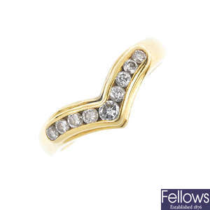An 18ct gold diamond wishbone ring.