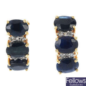 A pair of sapphire and diamond earrings. 
