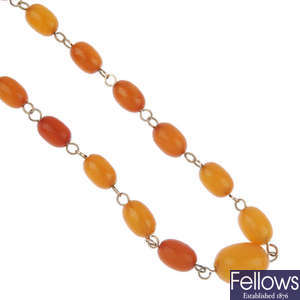 A selection of three natural amber bead necklaces.