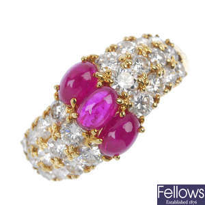 A ruby and diamond three-row dress ring.