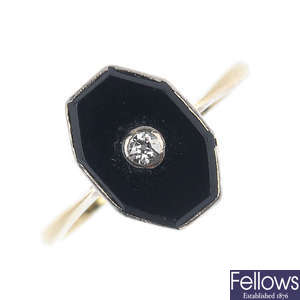 An early 20th century 18ct gold onyx and diamond ring.