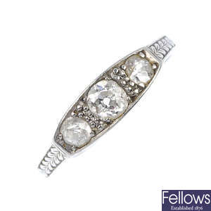 An early 20th century platinum and diamond three-stone ring.