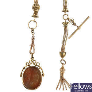 A carnelian intaglio pendant and Albert chain.