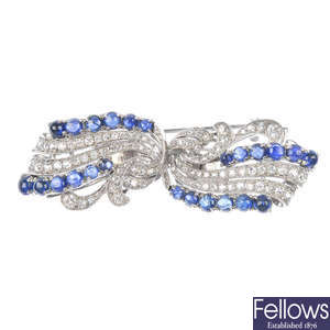 A mid 20th century sapphire and diamond double clip brooch.