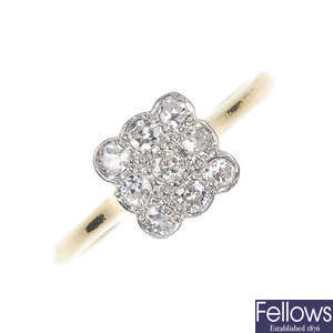 An early 20th century platinum and 18ct gold diamond cluster ring.