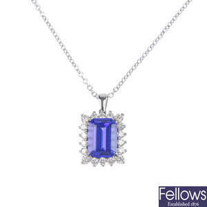 A tanzanite and diamond cluster pendant.