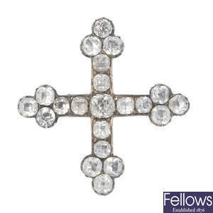 A late 19th century silver foil-back paste cross brooch.