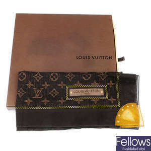 LOT:936  LOUIS VUITTON - a monogram Mini Lin Croisette Marina bag