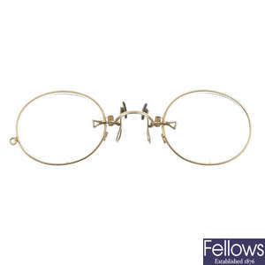 A pair of early 20th century 9ct gold pinz nez.