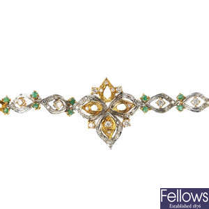 An 18ct gold diamond and emerald bracelet.