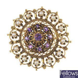 A gold amethyst and pearl brooch.
