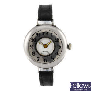 A silver gentleman's trench style wrist watch.