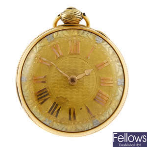 An 18k gold open face pocket watch by W.T. Dulin.