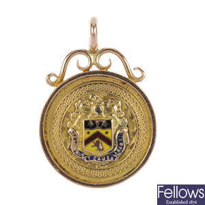 An early 20th century 9ct gold enamel medallion. 
