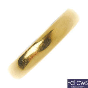 A mid 20th century 22ct gold D-shape band ring.