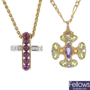 Two 9ct gold gem-set cross pendants.