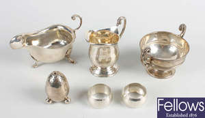 A group of assorted silver to include an Edwardian pair of silver bud vases