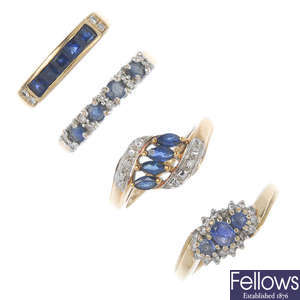 A selection of four 9ct gold sapphire and diamond rings.