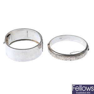 Two silver hinged bangles
