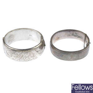 Two silver hinged bangles