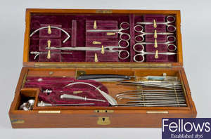 A good mahogany box of army surgical instruments by S. Maw Son & Sons