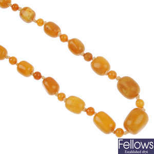 A natural amber bead single-strand necklace.