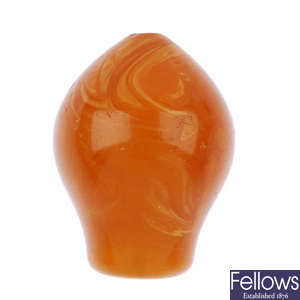 A natural amber shisha mouth piece.