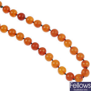 A natural amber bead single-strand necklace.