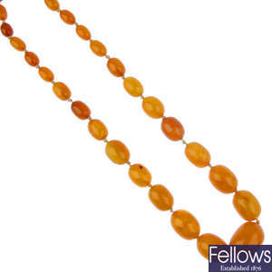 A natural amber bead necklace. One bead cracked