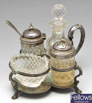 A mid-Victorian silver and glass cruet set. 