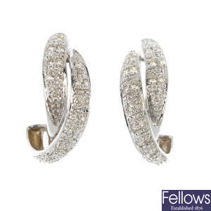 A pair of 18ct gold diamond ear cuffs.