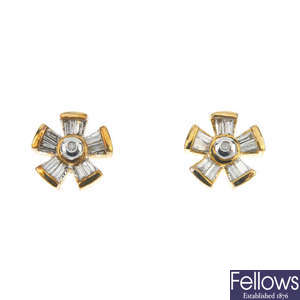 A 9ct gold diamond pendant and matching ear studs.