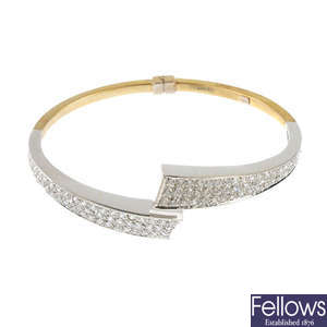 A 9ct gold paste hinged bangle.