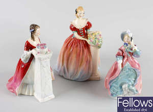 A group of seven figures to include Royal Dolton and Coalport examples, etc.