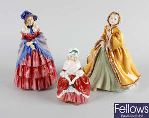 A group of four Royal Doulton figures