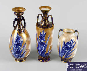 Three twin handled Royal Doulton iris vases