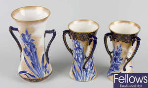 A pair of Royal Doulton isis vases, plus another