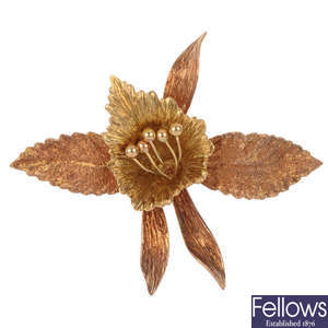 A 1960s 9ct gold orchid brooch.