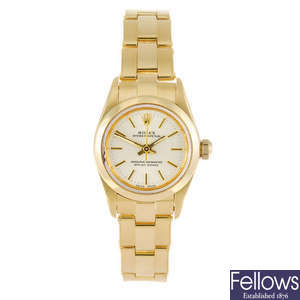 ROLEX - a lady's 18ct yellow gold Oyster Perpetual bracelet watch.