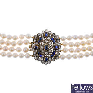 A sapphire, diamond and cultured pearl four-row necklace.