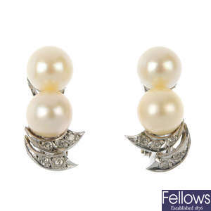 A pair of cultured pearl and diamond ear clips.