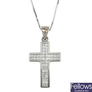 A 9ct gold diamond cross pendant with chain.