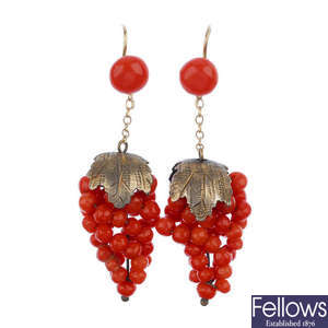A pair of composite early 20th century coral ear pendants.