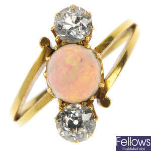 A mid 20th century 18ct gold opal and diamond three-stone ring.