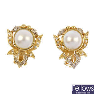 A pair of mabe pearl and cubic zirconia earrings