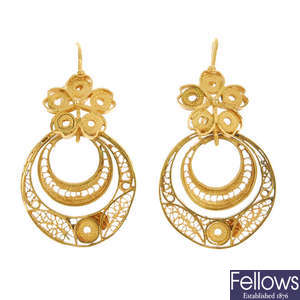 A pair of filigree ear pendants.