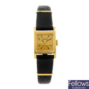 ROLEX - a lady's yellow metal Precision wrist watch. 