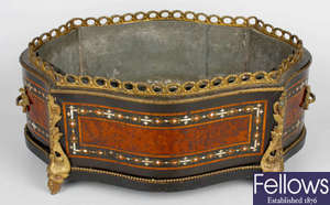 A late 19th century ebonised and amboyna planter or cooler