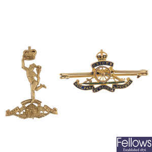 A selection of three gold Regimental and other items.