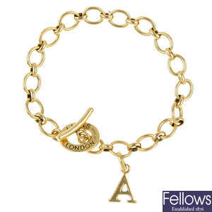 LINKS OF LONDON - an 18ct gold charm bracelet and charm.